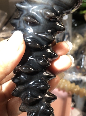 天然牛角按摩梳一物一拍海参黑金刚