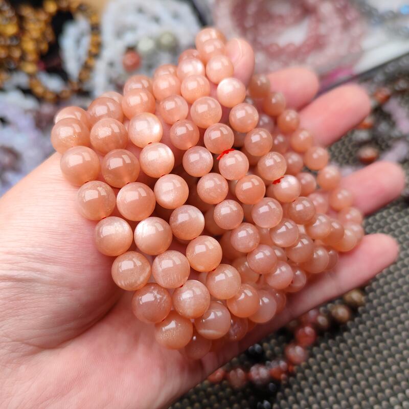天然粉橙月光石手链女单圈金沙太阳石手串甜美斜长石猫眼水晶饰品,淘宝优惠券,粉丝福利购,淘宝优惠卷