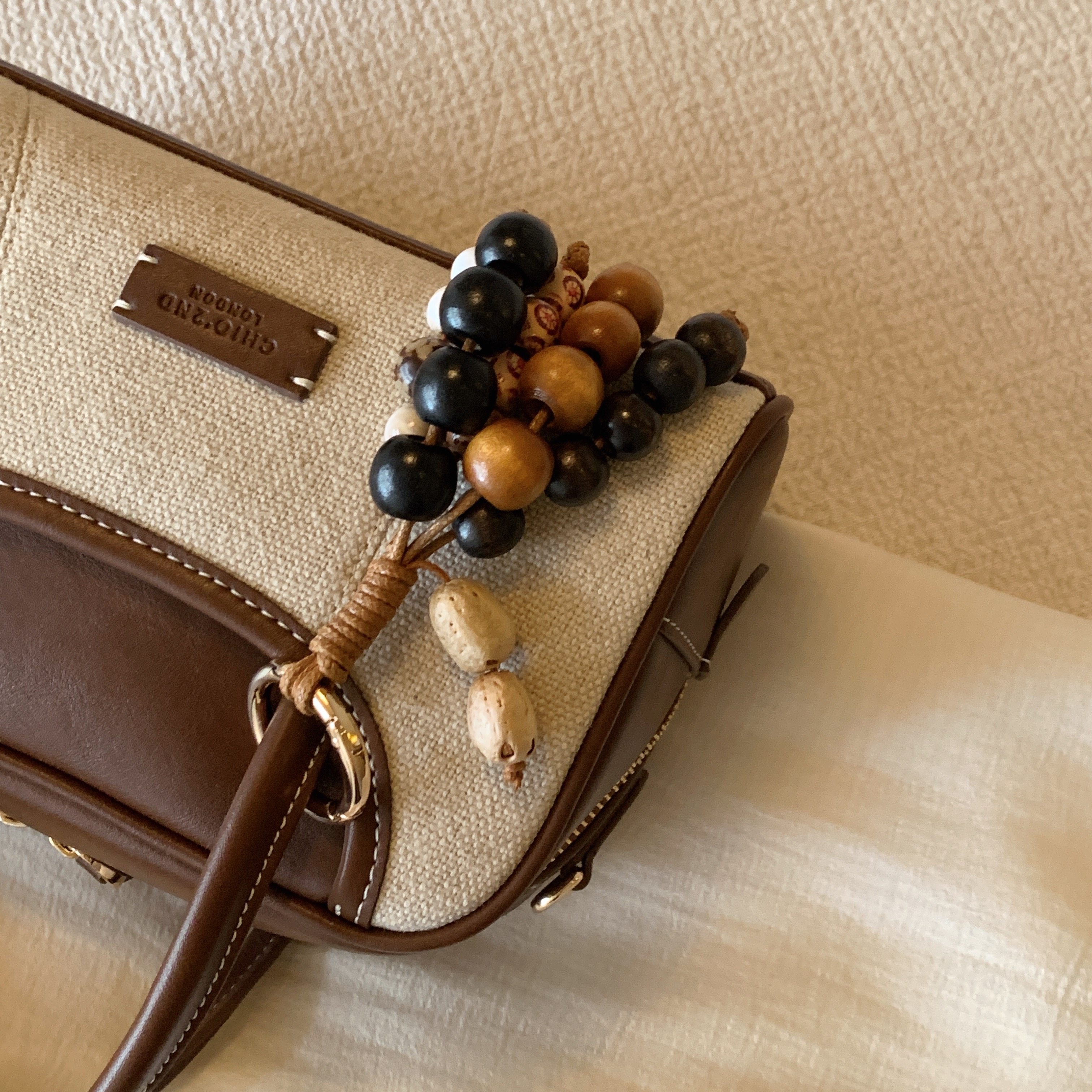 南风Chio2nd 赫本花园枕头包包女2026新款复古拼色手提包单肩斜挎,淘宝优惠券,粉丝福利购,淘宝优惠卷