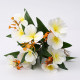 Simulated artificial flowers and green plants decorative leaves and begonia flowers
