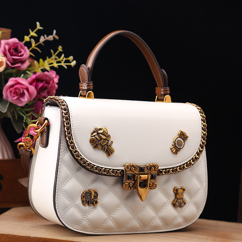 古萨驰正品真皮女包2025新款时尚徽章百搭休闲菱格单肩斜挎小圆包,淘宝优惠券,粉丝福利购,淘宝优惠卷