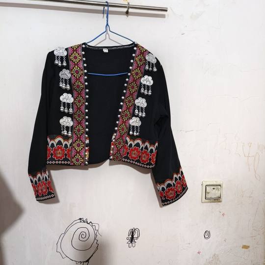 Hani ethnic minority coat daily life