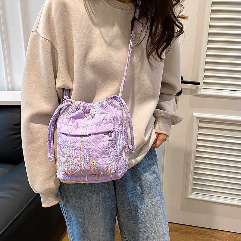 夏季帆布包包女2024新款日韩系单肩抽带水桶包小众百搭通勤斜挎包,淘宝优惠券,粉丝福利购,淘宝优惠卷