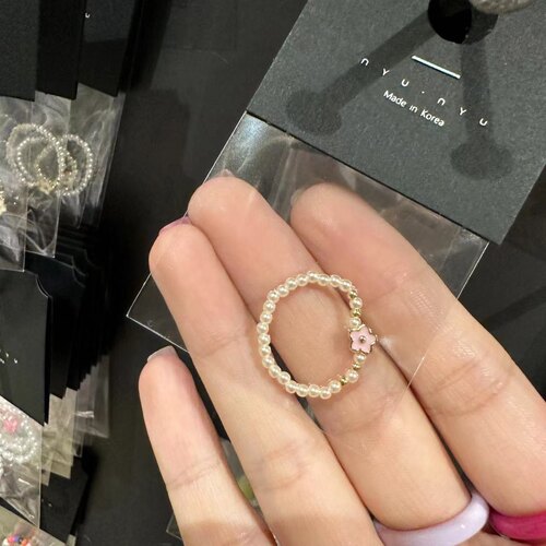 370423韩国东大门nyunyu金属釉面小花珍珠弹力绳戒指 - 图0