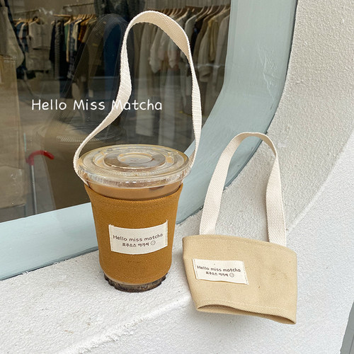 每天一杯快乐起飞 抹茶布袋 原创帆布奶茶袋女手拎咖啡袋水杯套袋 - 图1