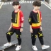 Bộ đồ bé trai mùa thu 2019 mới cho bé trai đẹp trai diện đồ thể thao hai mảnh trên không trong bộ đồ trẻ em lớn của Hàn Quốc - Phù hợp với trẻ em Phù hợp với trẻ em