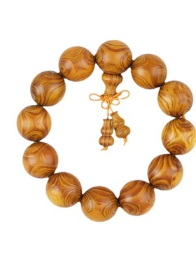 黄金柚檀木取芯鬼脸对眼佛珠手串