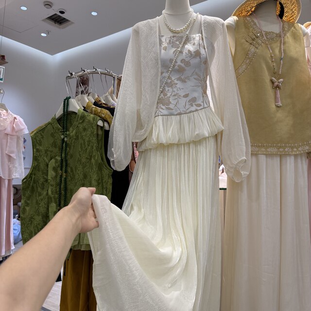 Pre-2026 summer ໃຫມ່ແບບຈີນແບບຈີນແບບ suspender ປ້ອງກັນແສງແດດ cardigan + ກະໂປງແອວສູງສອງຊຸດສໍາລັບແມ່ຍິງ