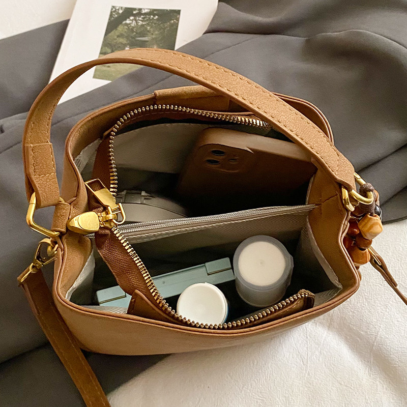 高级感爆款小包包女式2025秋冬新款潮时尚单肩手提包斜挎包水桶包,淘宝优惠券,粉丝福利购,淘宝优惠卷