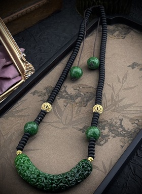 平安吉物原创复古高级古朴深沉黑色绳链亮眼绿色雕刻镂空圆球项链
