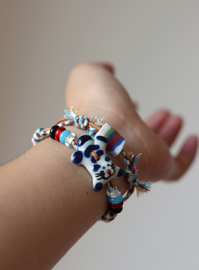 孤品系列秋冬新品缤纷动物园叠戴陶瓷编绳纽扣手链手作可爱饰品