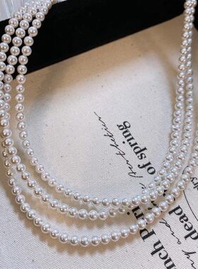 2024春夏极细小米珠澳白珍珠毛衣链女气质百搭名媛网红OT扣长项链