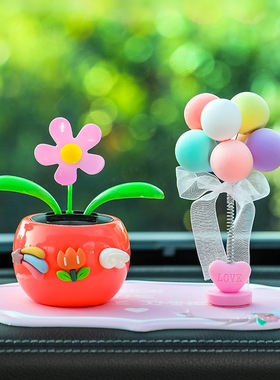 汽车摆件太阳能夏季车内装饰网红车载太阳花中控台高级感小摆件女