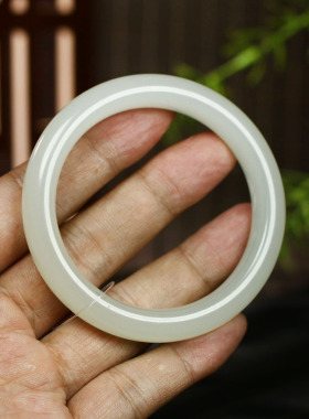 古晨和田玉冰晴水圆条手镯