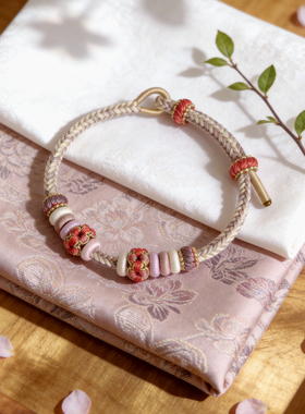 手工编织绳橙色转运珠手绳