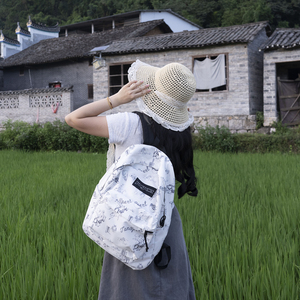 JanSport西部牛仔印花学生双肩包