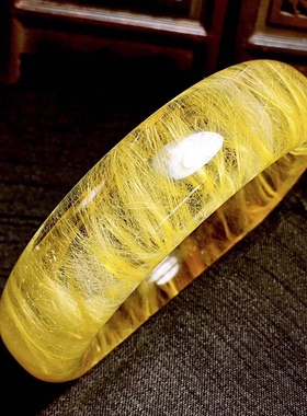 天然发晶手镯金发晶顺发晶手镯内径：56mm宽28mm厚15mm.