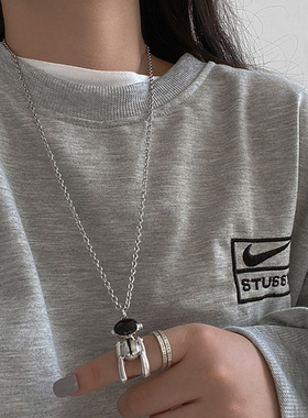 Astronaut patterned necklace for women