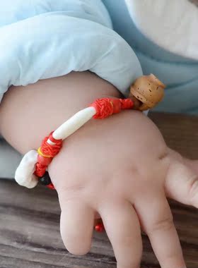 小孩桃核猪惊骨黑狗牙红绳手链