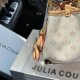 JULIA COURIER ກະເປົາແບນເນມພິມສູງ