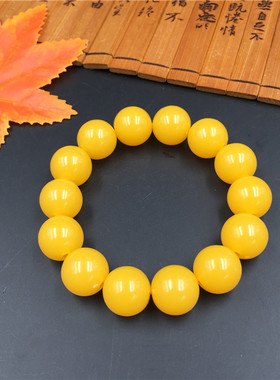 鸡油黄树脂蜜蜡手串宫廷