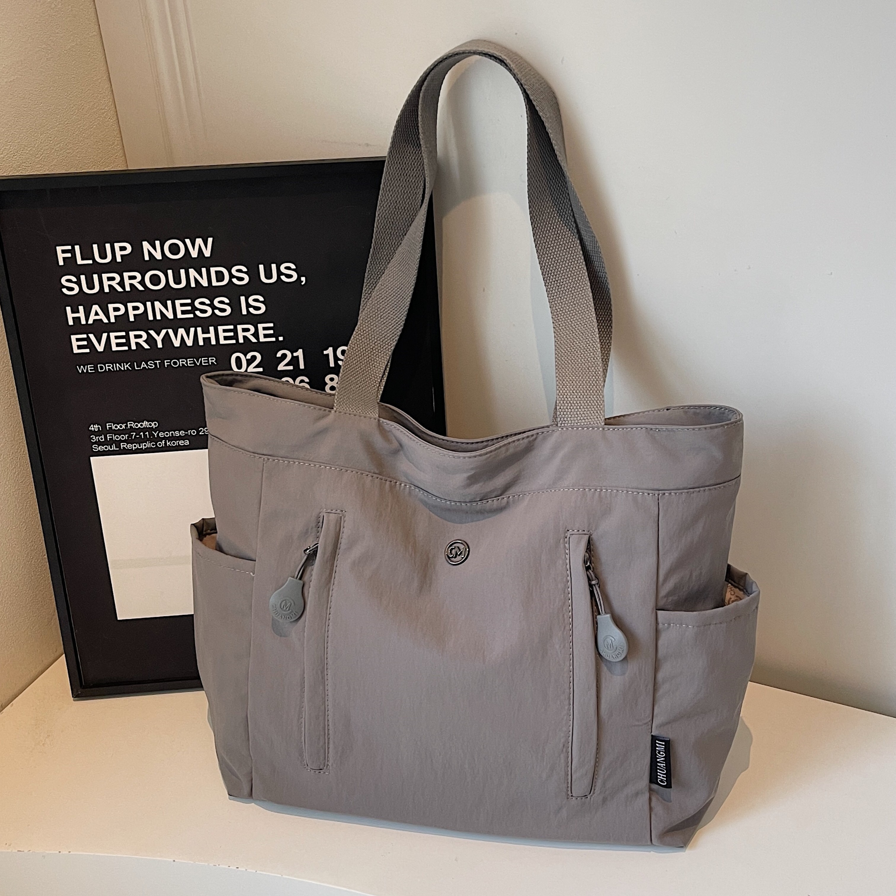 韩版帆布托特包包女2025新款大容量手提通勤包简约百搭休闲单肩包,淘宝优惠券,粉丝福利购,淘宝优惠卷