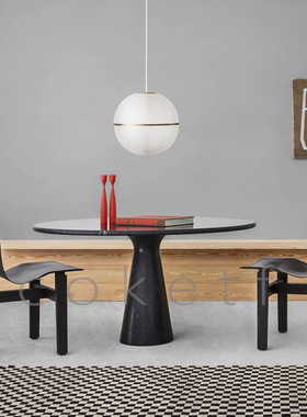 侘寂风洞石圆形客厅餐桌家用大理石餐厅饭桌设计师款洽谈桌餐台