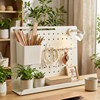 Desktop perforated board workstation baffle storage rack