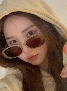 奶茶色椭圆墨镜猫眼白色眼镜