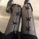 Pure Xiaomo black silk bow hollow fishnet stockings