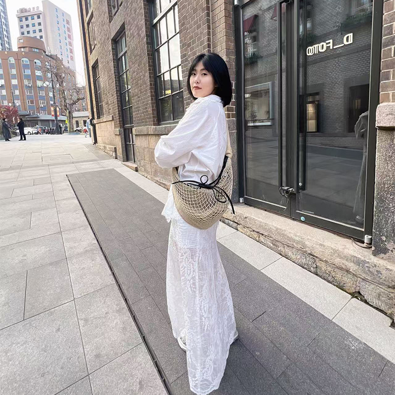 lem轻奢小众高级感斜挎牛角网兜包慵懒aire编织包单肩腋下渔网包-图2