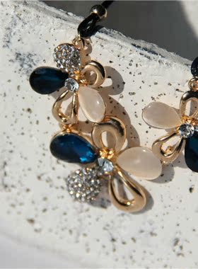花朵水钻蓝宝石金色镂空毛衣链