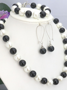 油菜花玻璃珍珠圆形女白黑色套装
