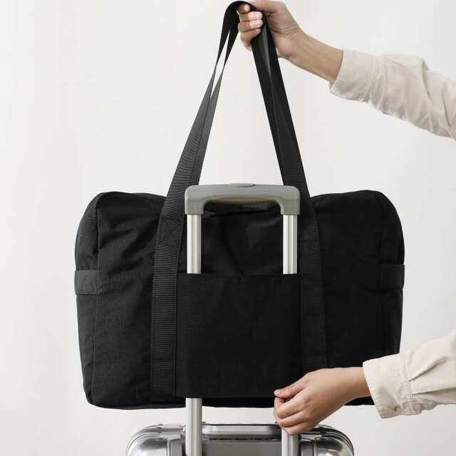 Japanese style duffel bag can be trolley case with handheld waterproof folding portable travel bag boarding men and women's clothing storage bag