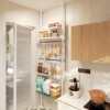 The rear storage rack of the upper ceiling hole panel door is ultra-thin, punch-free entrance entrance entrance entrance entrance door partition integrated metal storage rack