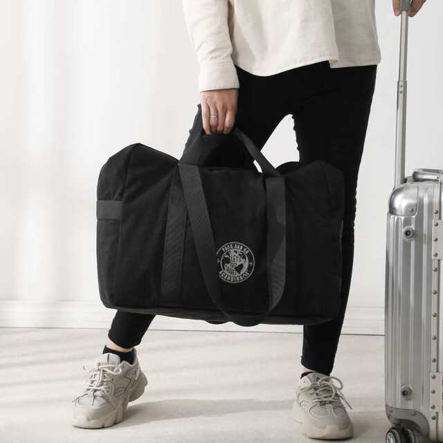 Japanese style duffel bag can be trolley case with handheld waterproof folding portable travel bag boarding men and women's clothing storage bag