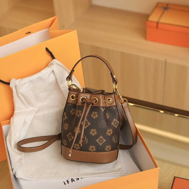 网红款迷你小水桶包2025新款女包时尚百搭手提老花包单肩斜挎小包,淘宝优惠券,粉丝福利购,淘宝优惠卷