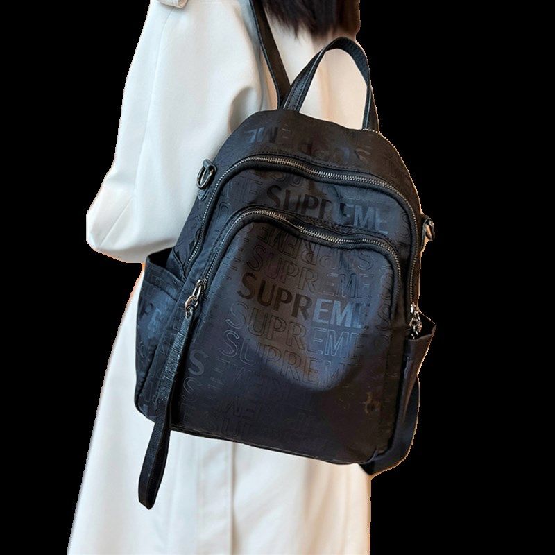 印花牛津布双肩包女2024新款防水轻便休闲旅游背包大容量两用包潮,淘宝优惠券,粉丝福利购,淘宝优惠卷