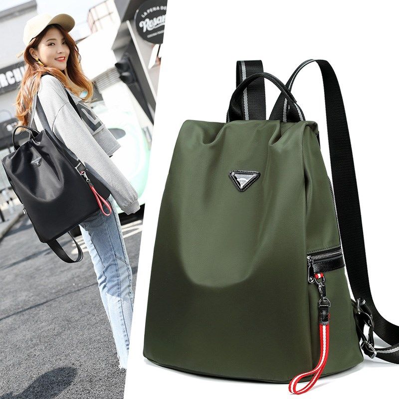 防盗双肩包女防水牛津帆布大容量韩版休闲女士旅行包流苏装饰背包,淘宝优惠券,粉丝福利购,淘宝优惠卷
