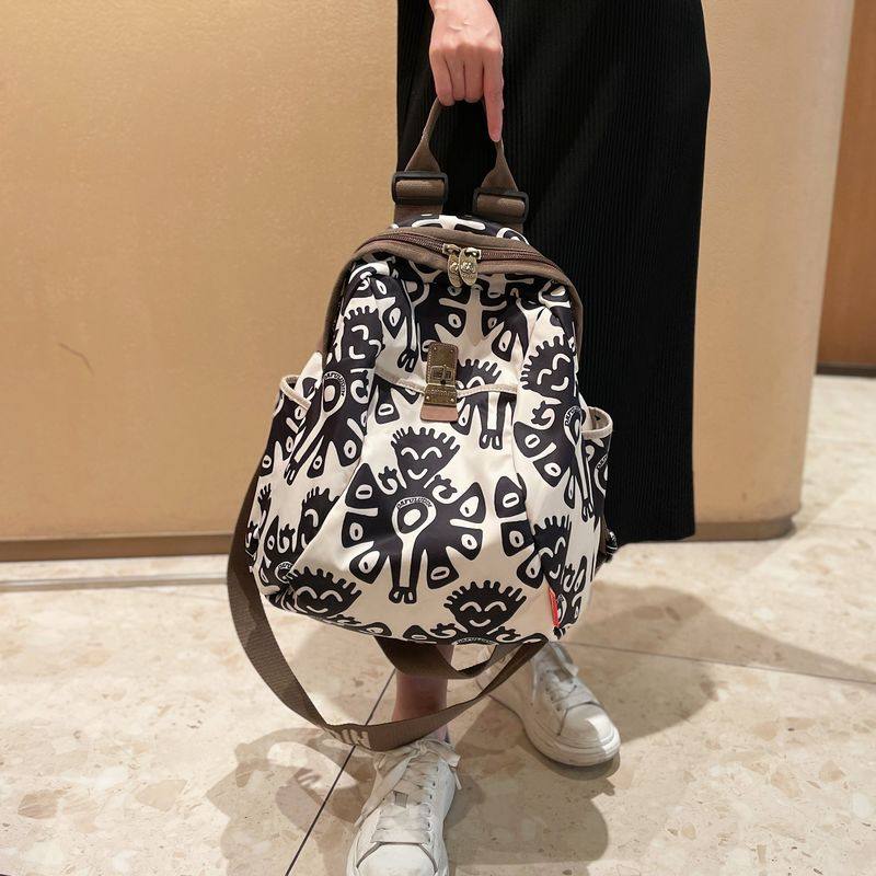 八爪鱼旅行双肩包女2023新款时尚帆布背包女士短途休闲通勤旅游潮,淘宝优惠券,粉丝福利购,淘宝优惠卷