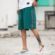 [1 quần 2T] Châu Âu và Hoa Kỳ quần thể thao gió retro nam lỏng lẻo Quần short giản dị Harajuku phiên bản Hàn Quốc của năm quần màu tím thủy triều - Quần Jogger thời trang nam Quần Jogger