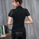 T-shirt de base à col roulé d'origine pour femmes T-shirt à manches courtes pour le printemps 2025 Nouvelle mince à manches à manches solides en maille européenne