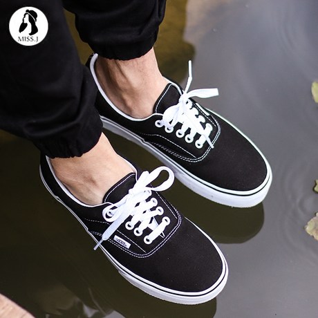 vans era authentic black