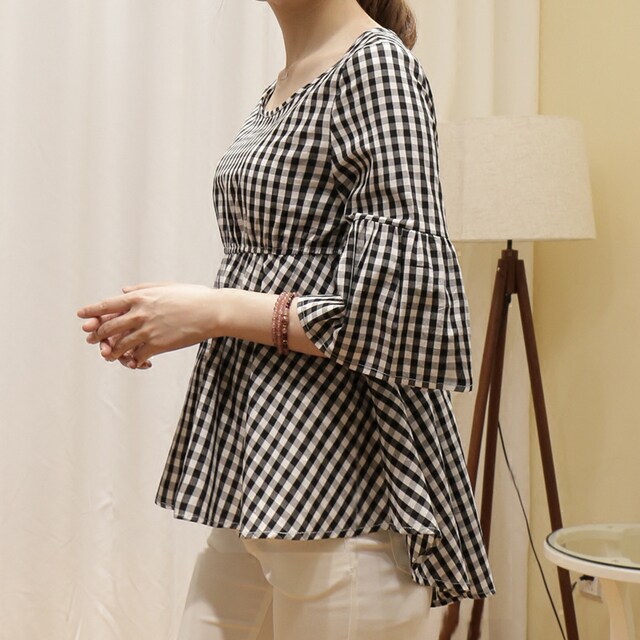Black and white cropped plaid shirt with short front and long back