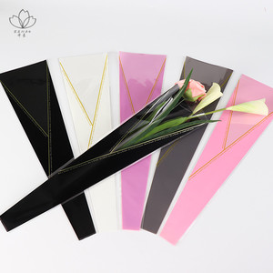 金三角磨砂雾面单支玫瑰康乃馨包装渐变袋哑光金线鲜花包装袋材料