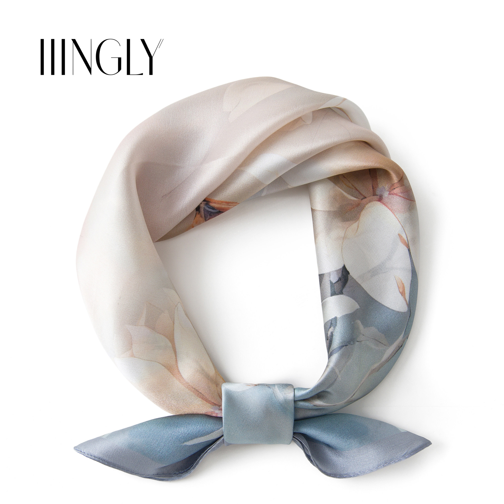 A gentle watercolor-style white magnolia silk square scarf, a fresh light blue mulberry silk scarf, perfect for everyday wear and commuting, adding a touch of style and versatility.