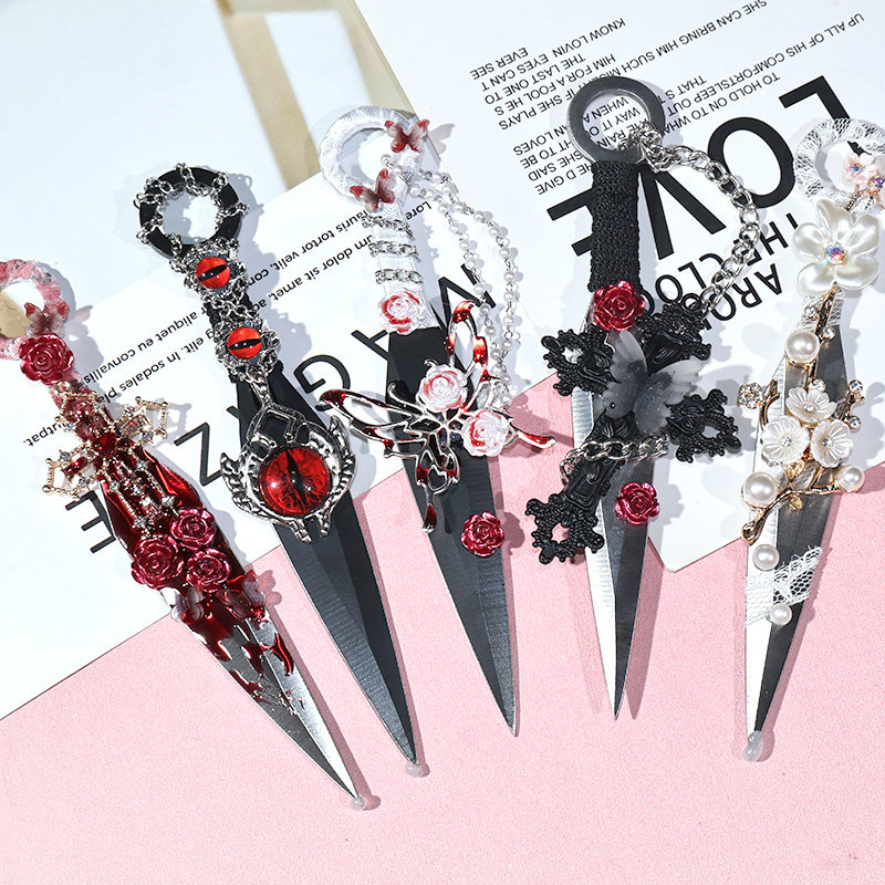 Colorful retro gothic style butterfly wings in Instagram style handmade kunai, handmade knife, finished product, craft knife, unboxing and ornament