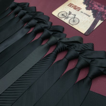 Black handmade tie with fine twill pattern and a wide variety of clean surfaces