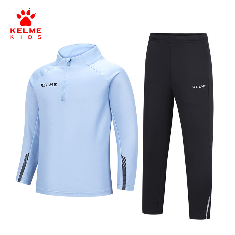 Детский спортивный костюм KELME Kelme можно сшить по индивидуальному заказу: полувысокий воротник, верхняя часть брюк на молнии, футбольная тренировочная форма