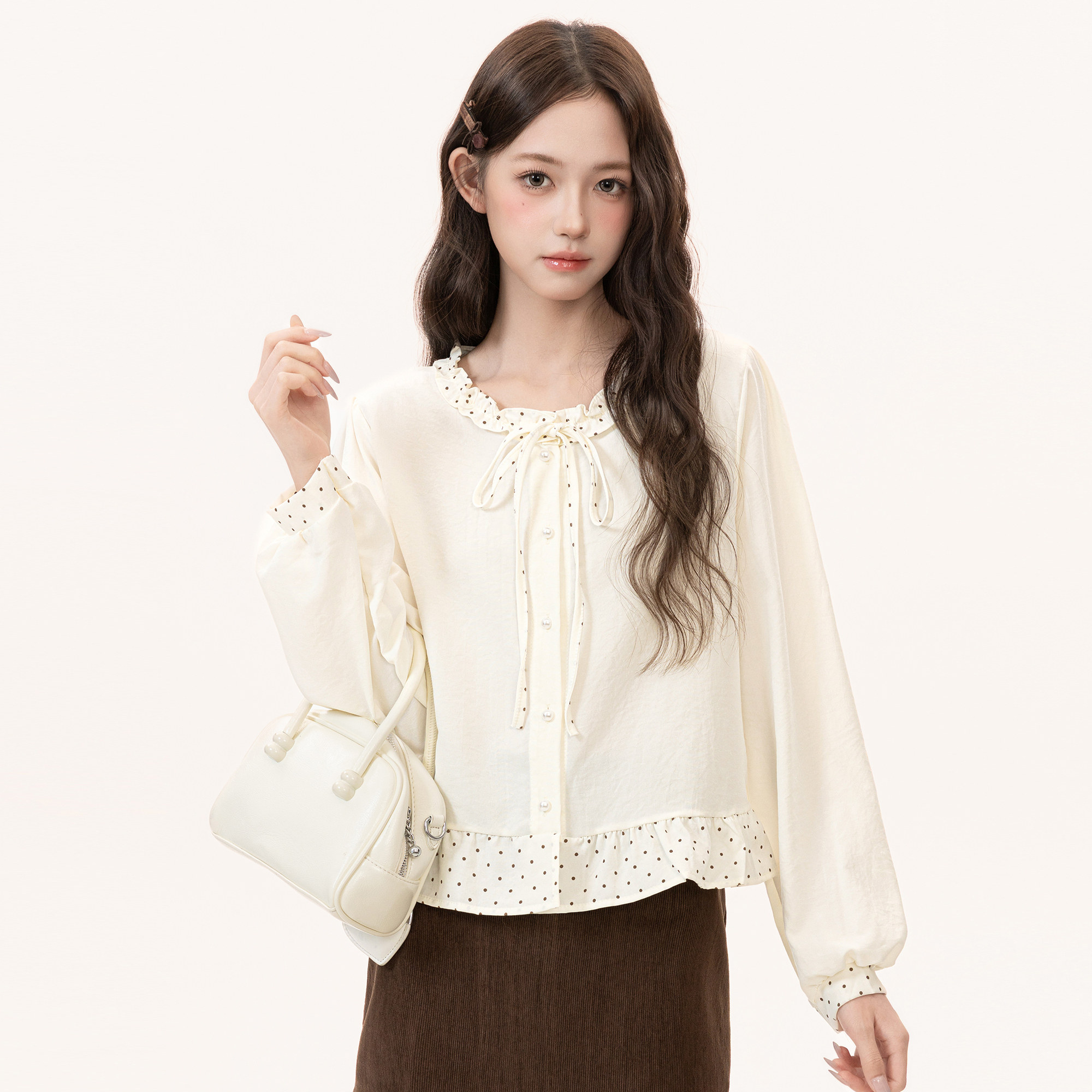 Apricot-colored, ruffled-trimmed, round-neck, long-sleeved blouse for women, 2026 spring and autumn new style, polka dot design, puff sleeves.